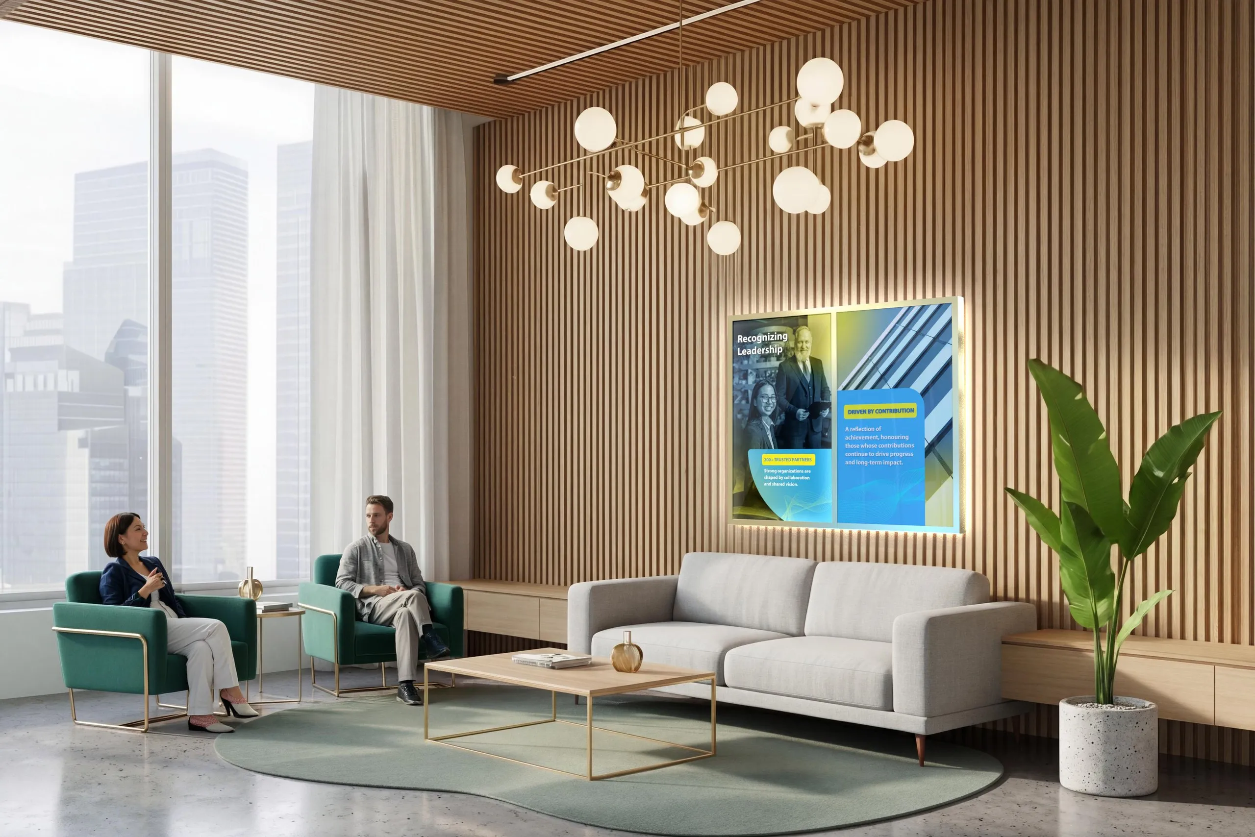 Designer Series recognition environment in a corporate lounge, a backlit wall pairing a digital recognition display with donor content, set among lounge seating and wood-panel architecture