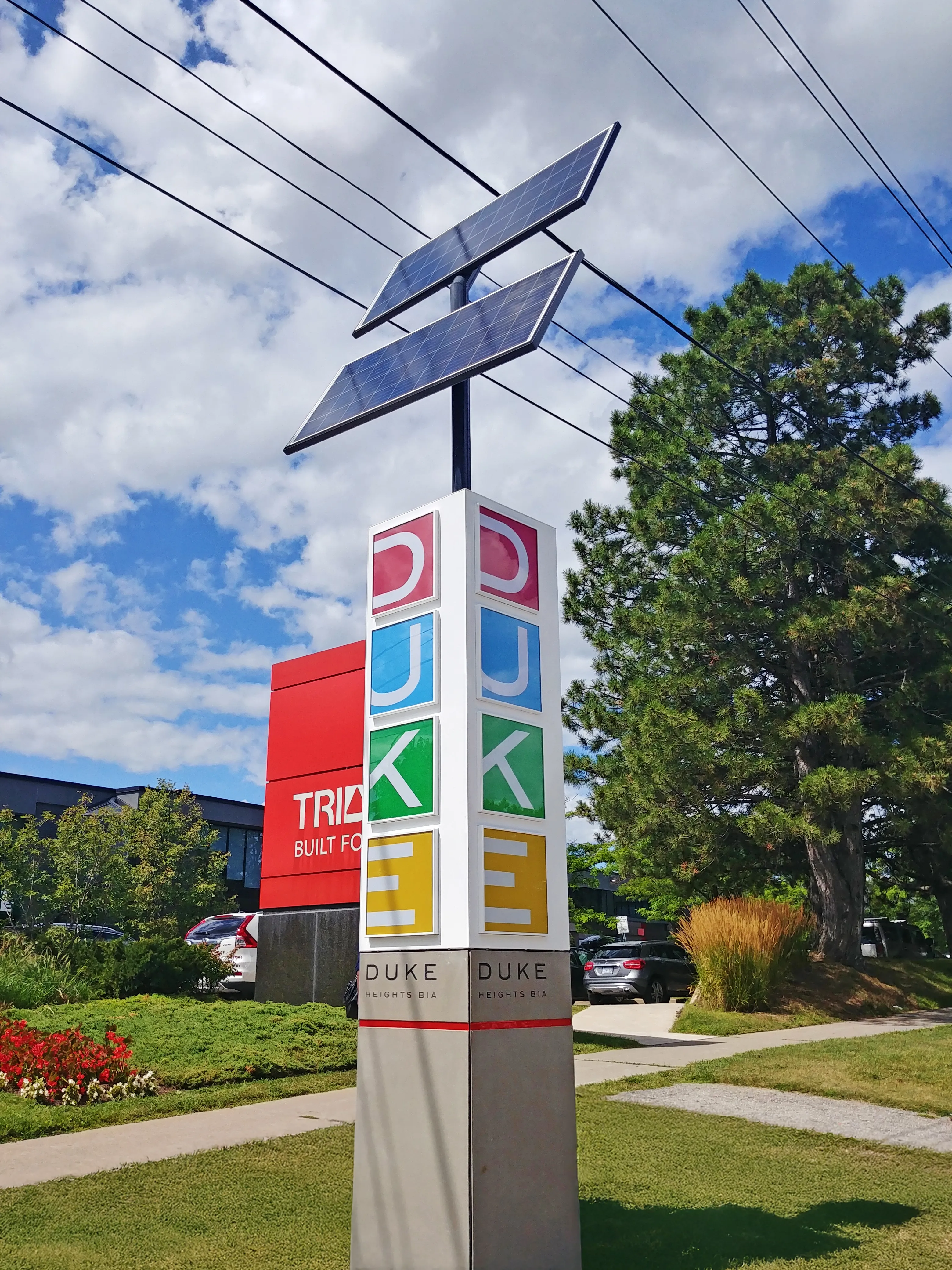 Duke Heights BIA solar-powered branded street marker