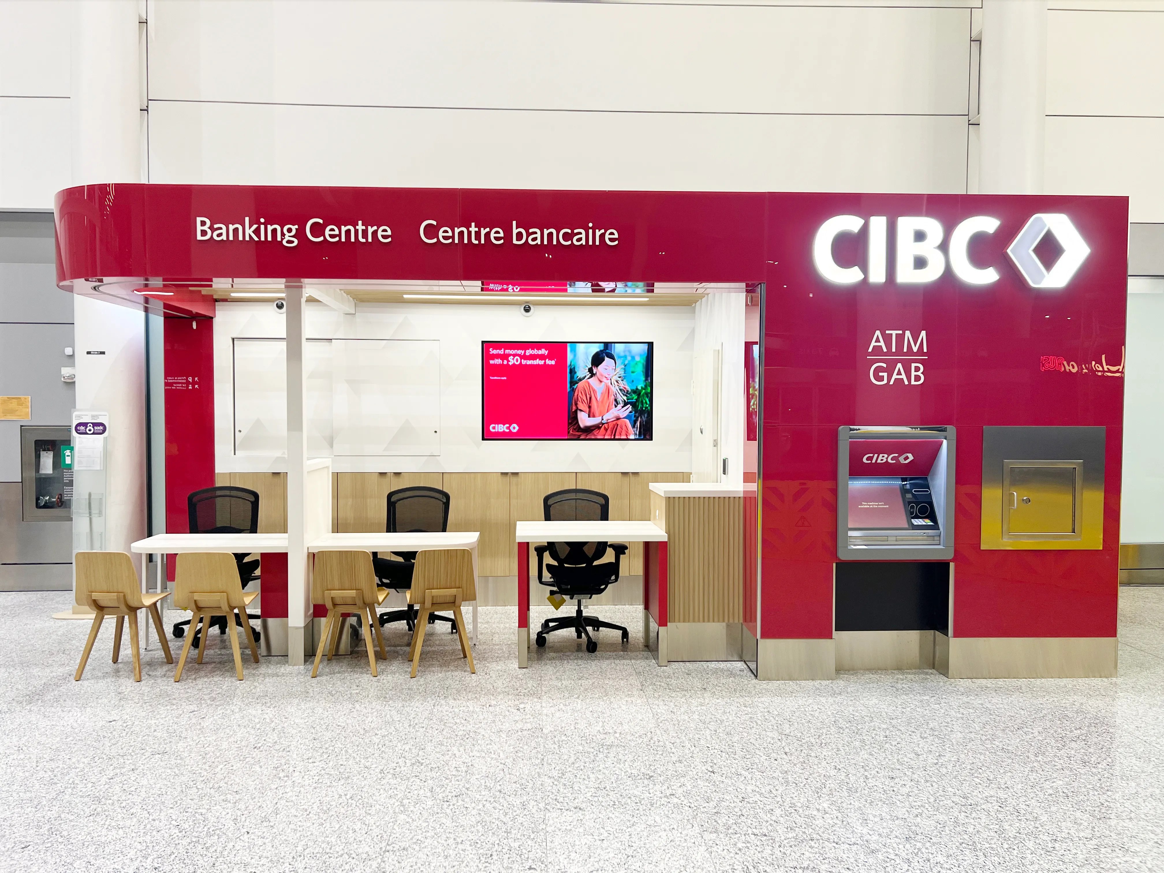 CIBC baggage carousel topper carrying campaign messaging