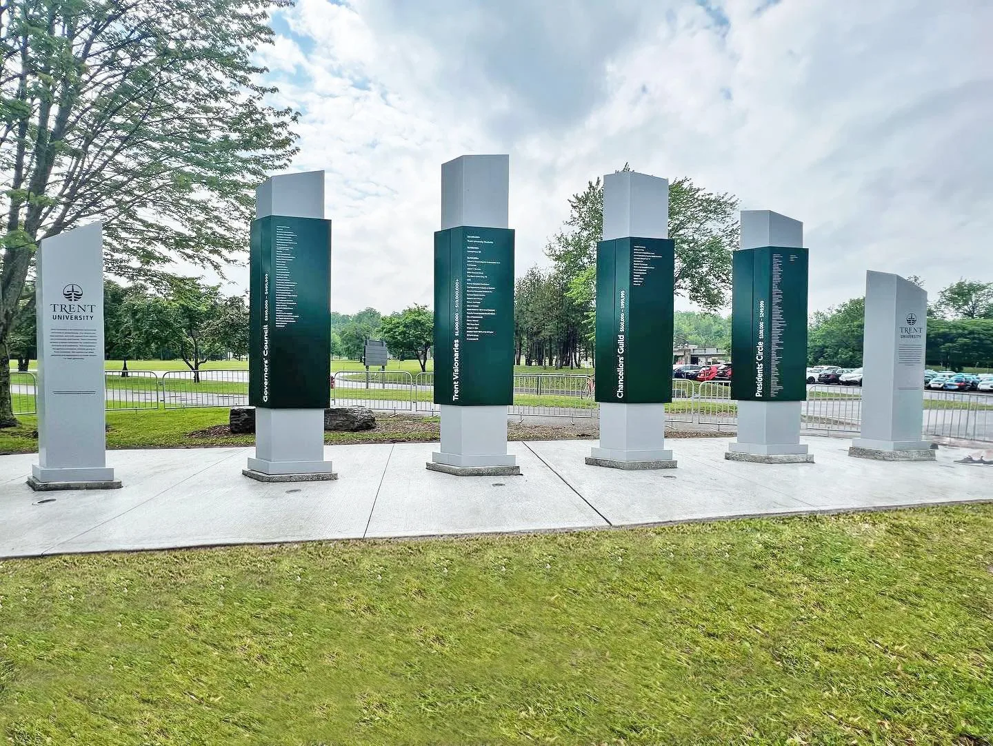 The Trent University donor recognition monoliths, a row of illuminated pillars carrying donor names on the campus green